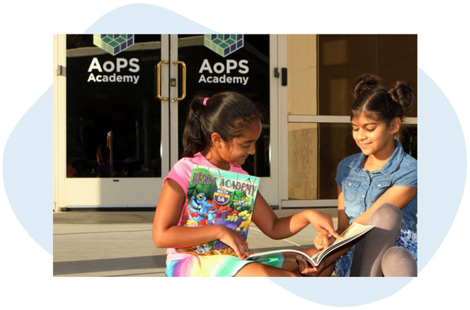 Students reading books at AoPS Academy
